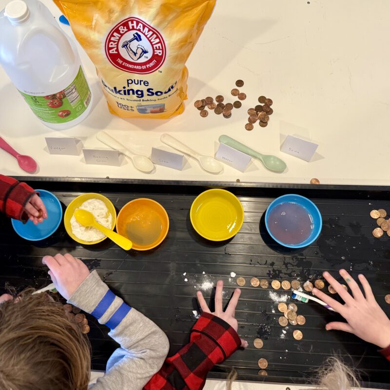 How to clean coins: photo of 4 kids using toothbrushes, soap, water, vinegar, baking soda to try to clean pennies